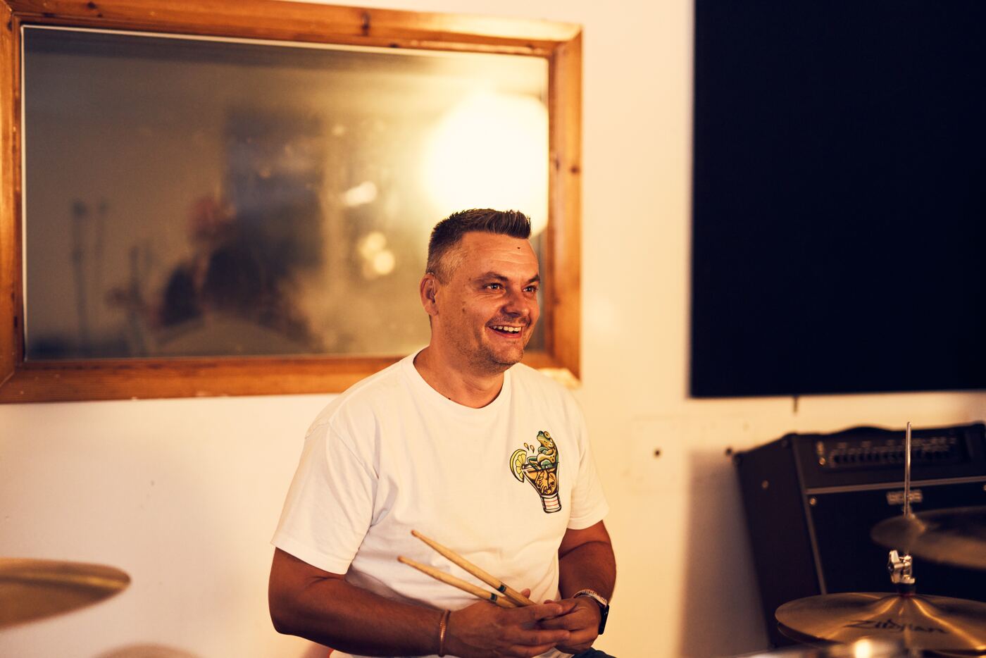 Grzeg laughing behind the drum kit